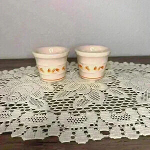 Longaberger Pottery WOVEN TRADITIONS CANDY CORN VOTIVE CANDLE set of two.